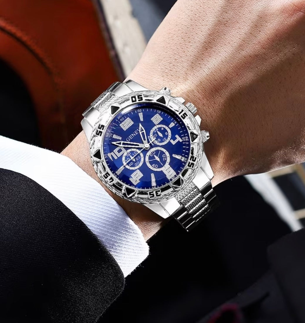 Men's silver-tone and blue watch worn with business attire