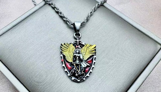 Stainless steel pendant and chain featuring a religious Saint Michael.
