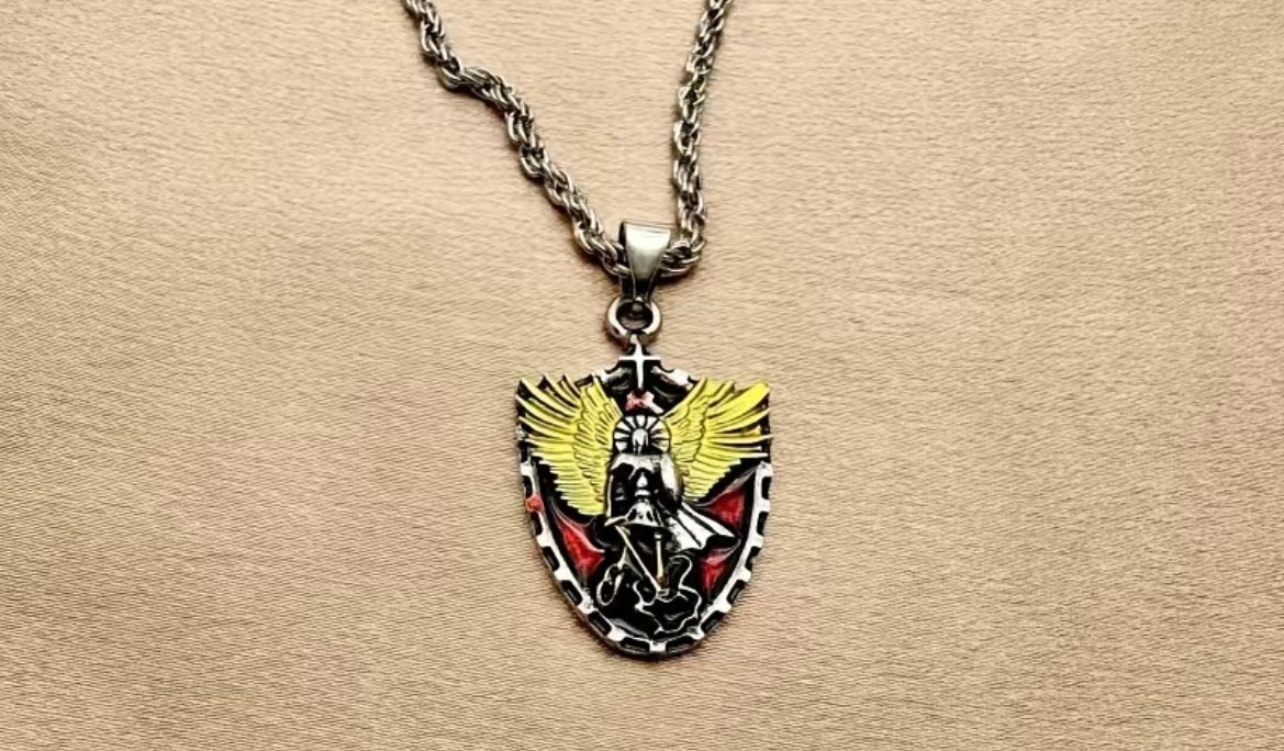 Stainless steel pendant and chain featuring a religious Saint Michael.