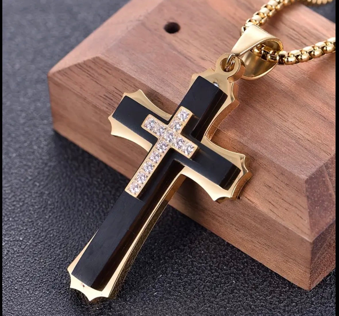A 202 Stainless Steel Multi-Layer Cross Pendant with Rhinestones is a stylish men’s necklace