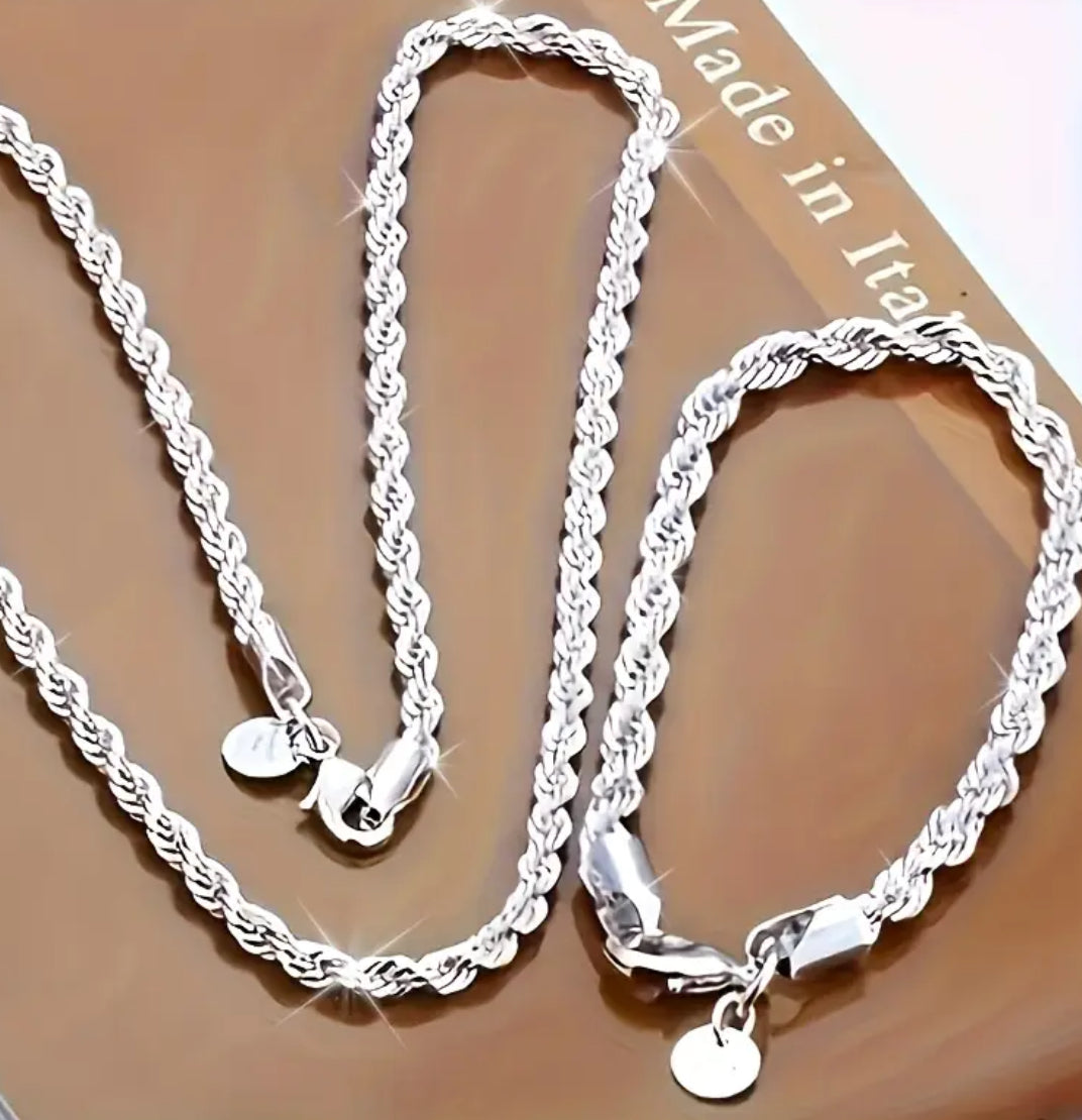 A stunning 925 Sterling Silver matching bracelet and chain