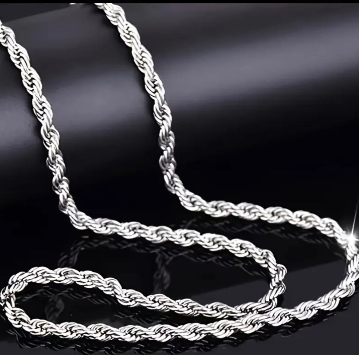 A stunning 925 Sterling Silver matching bracelet and chain